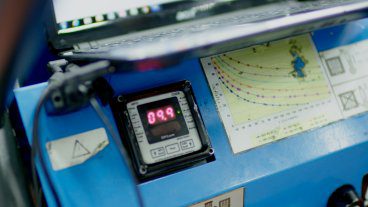 Taking an oil sample from industrial kit blog image