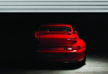 Red car in garage