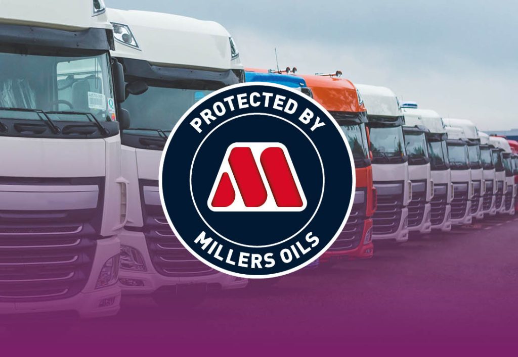 Image of some trucks lined up with the Protected by Millers Oils logo at the front